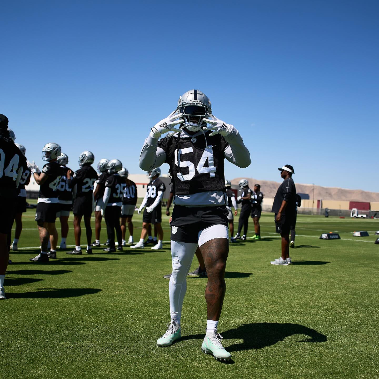 Jaylon Smith wearing number 54 at football practice